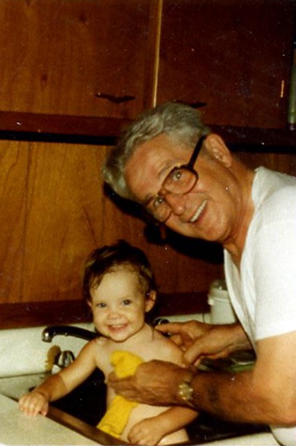 Julie_081.jpg - You enjoyed being around Grandpa Jutras.  The picture was taken at our cabin on Lake Allatoona.