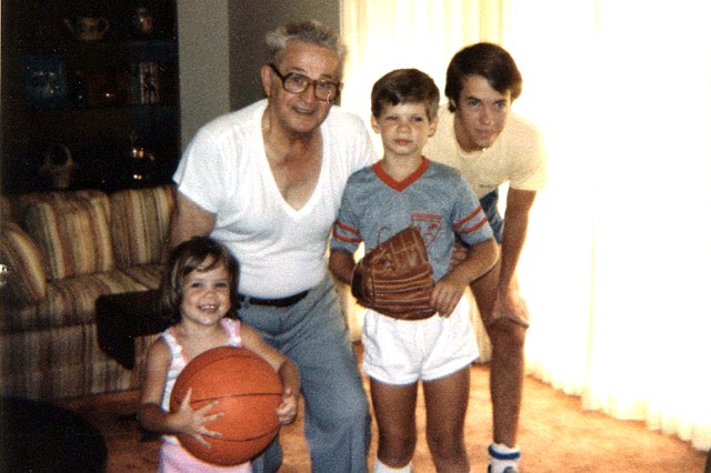 Julie_206.jpg - With Grandpa Jutras and the boys at Angus Trail.  The photographer obviously interrupted a sports event -- there was always a game of some sort going on in the circle.