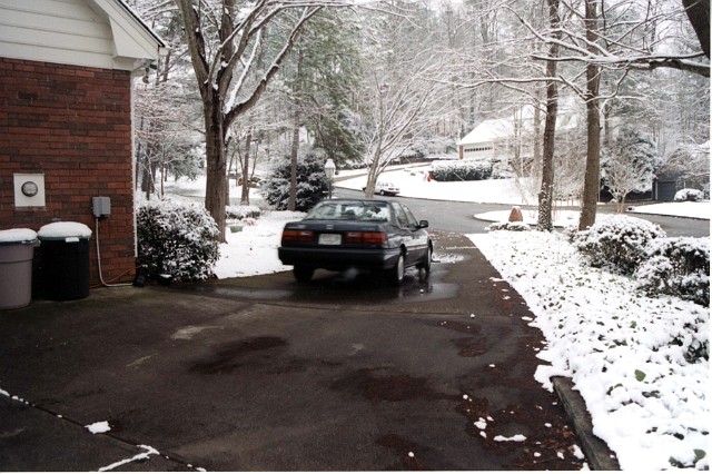 Julie_183.jpg - What, us worry about your driving on slick streets?  February 1999