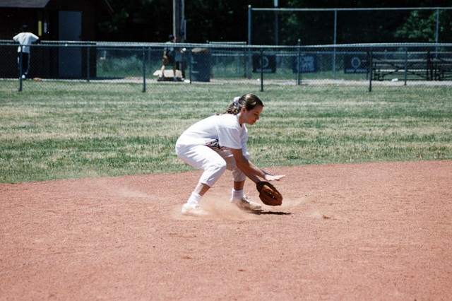 Julie_140.jpg - Ball is in the mitt.  Dad always held his breath when a grounder came your way lest it take a high hop ...
