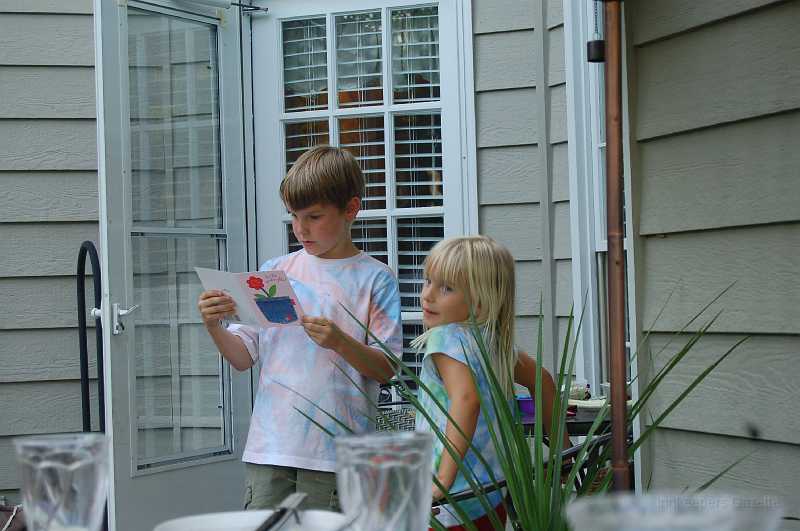AbbysBirthday_2006_006.JPG - Chace helped Abby with the big words in her birthday cards.