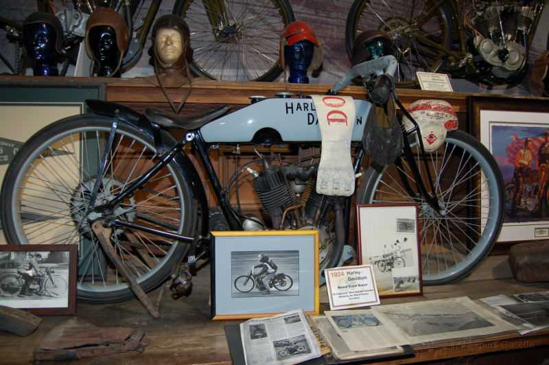 wheelsThruTime0020.JPG - A 1924 Harley-Davidson board tracker. Dale is riding the bike in the picture.  I believe this is the bike he rode cross country after restoring it.