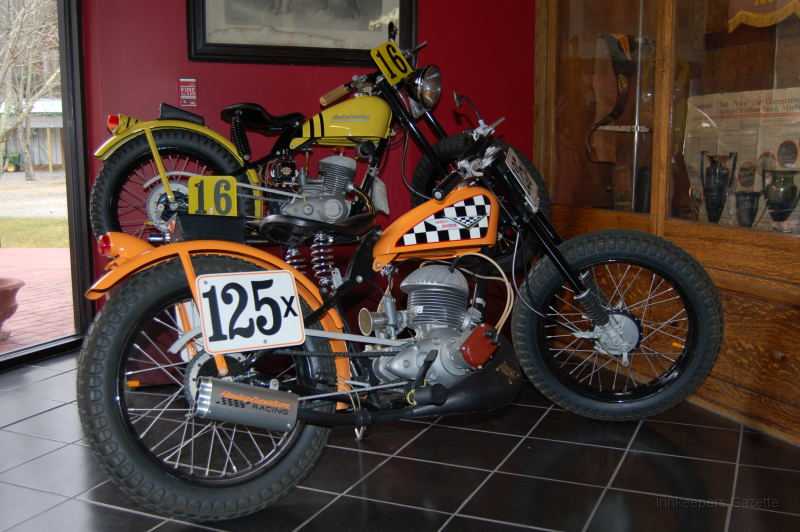 wheelsThruTime0038.JPG - Two small bore two stroke Harely-Davidson dirt trackers.