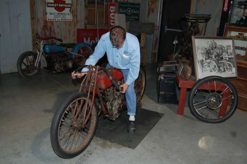 wheelsThruTime0056.JPG - She's coming to life.  Dale is adjusting the fuel mix by choking off air till she warms up.